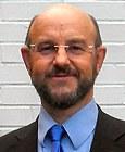 Dr Andrew  Coburn